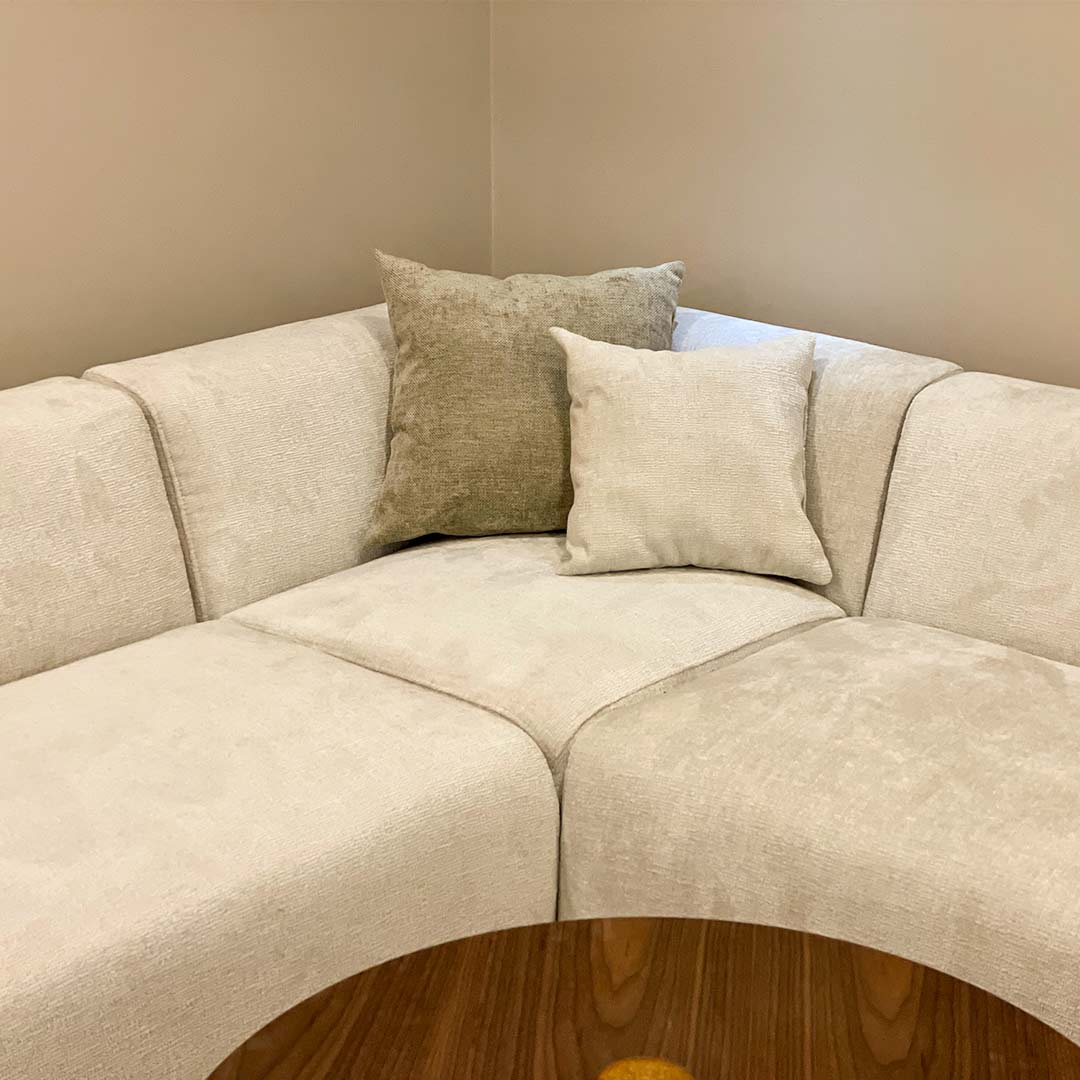 Modular sofa in beige upholstery