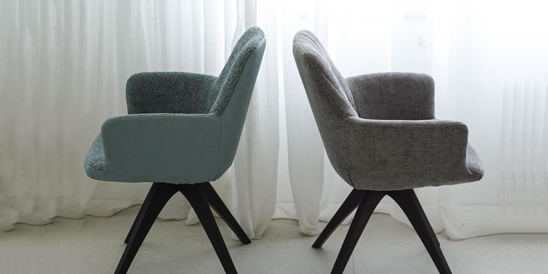 Dining armchair Asya with black oak legs and grey and mint upholstery