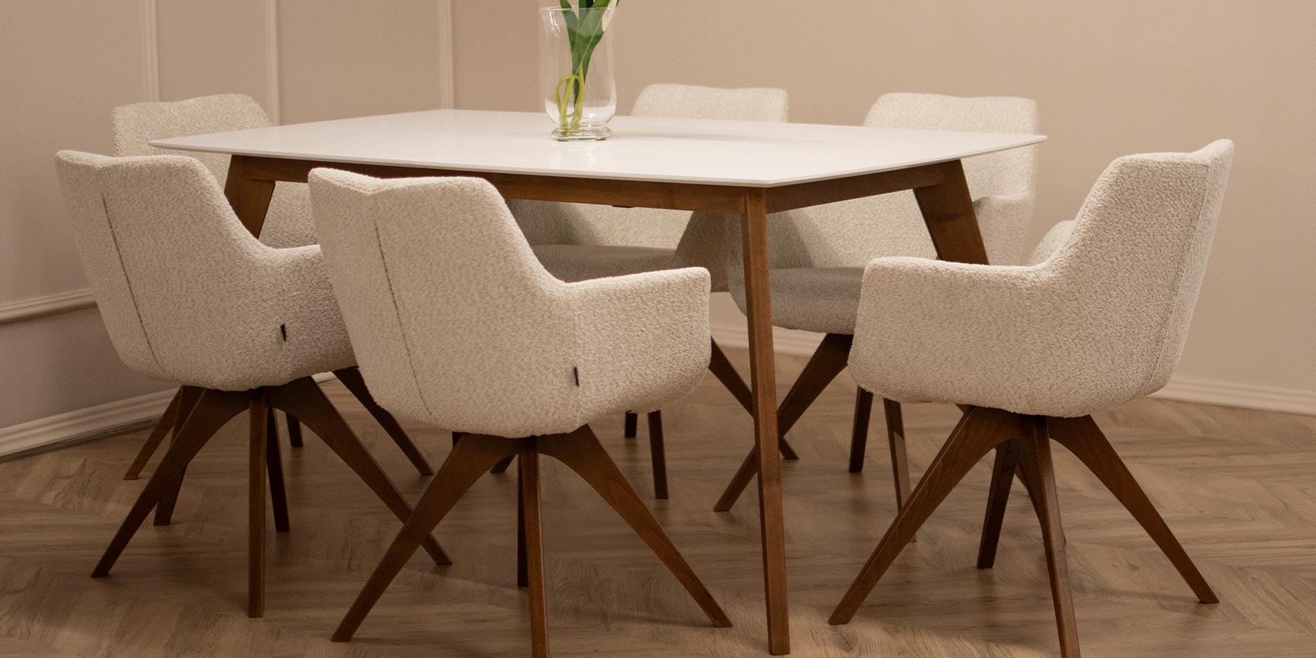 Dining room with chair Kerol with beech wooden legs and cream boucle and table Rigel.