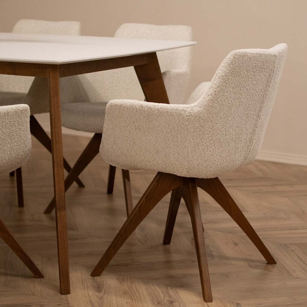 Dining room with chair Kerol with beech wooden legs and cream boucle and table Rigel.
