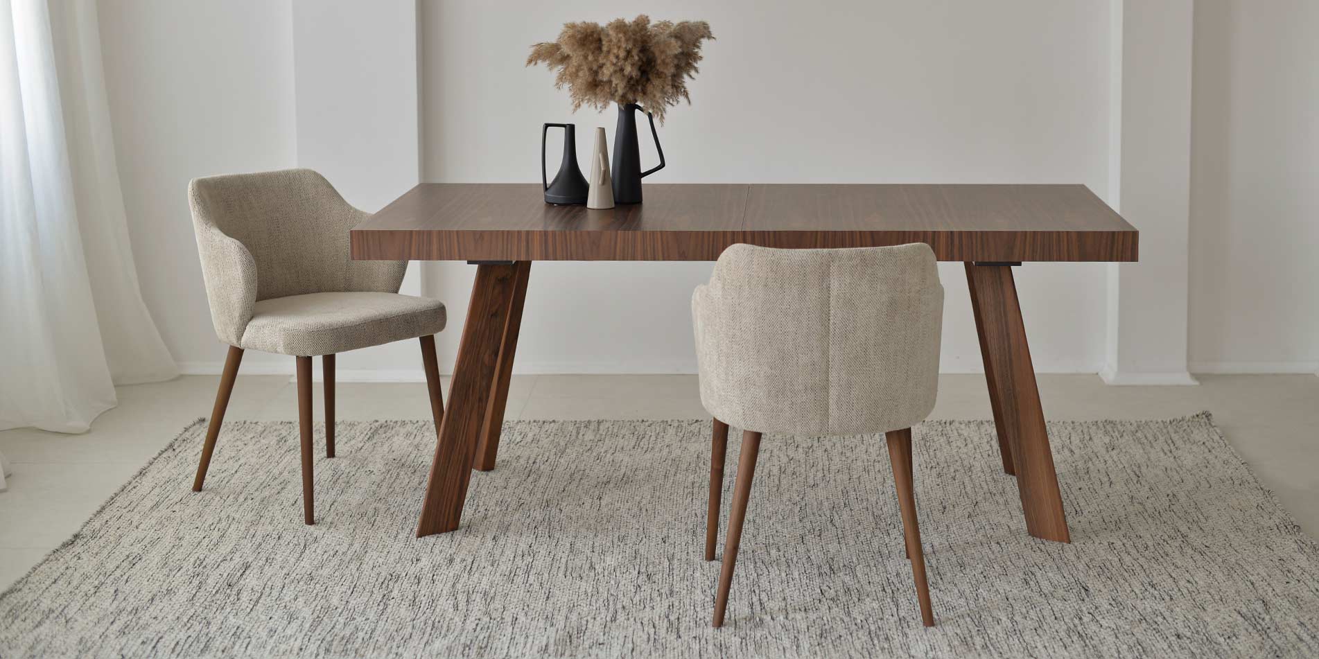 Dining table Vega by Mahagoni Furniture in walnut wood and beige dining chairs