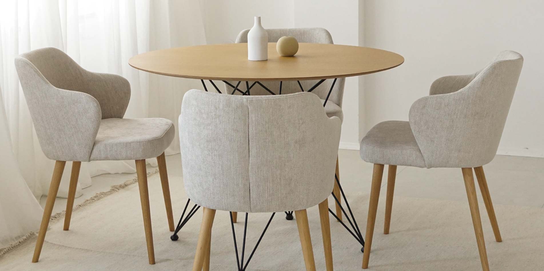 Small round dining table with oak table top and four dining chairs by Mahagoni Furniture