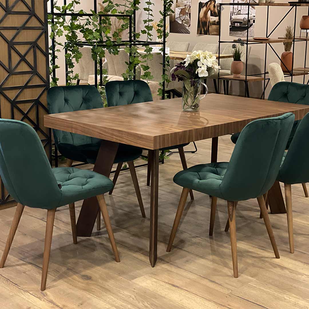 Dining table Vega by Mahagoni Furniture in walnut wood with green chairs