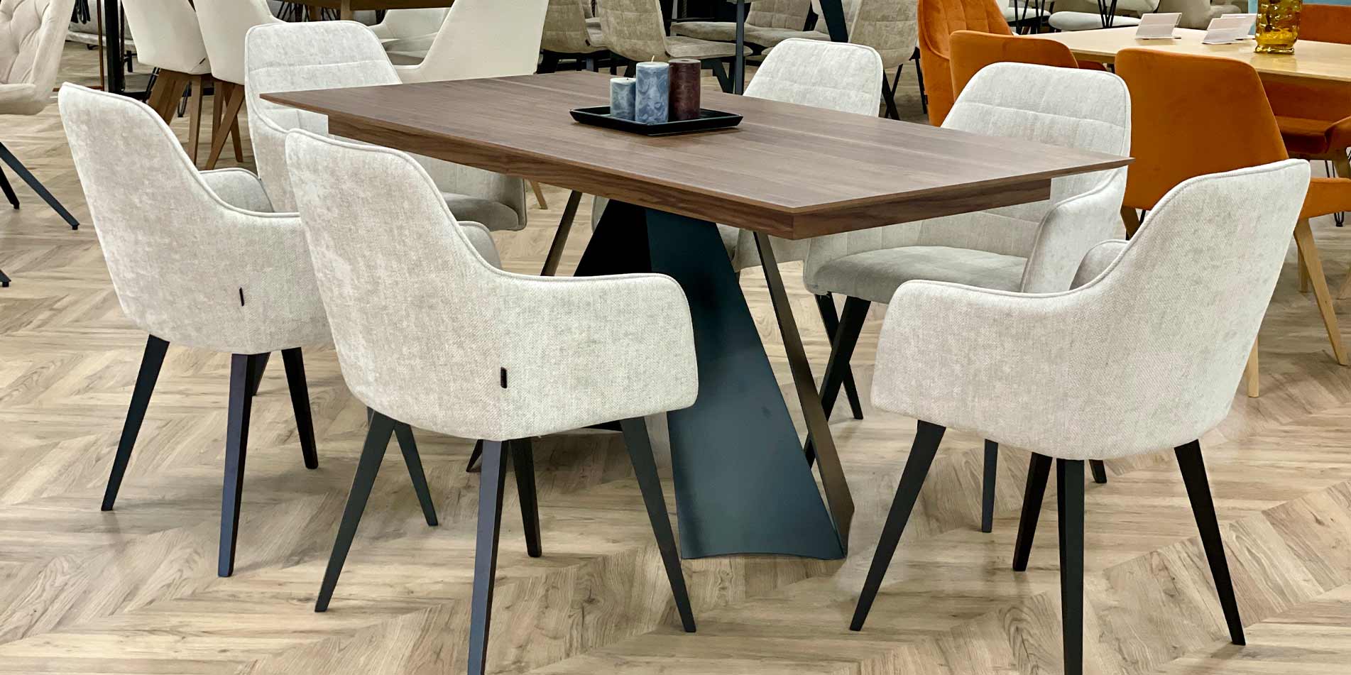 Dining table Cassini with walnut MDF table top and black metal legs with white chairs