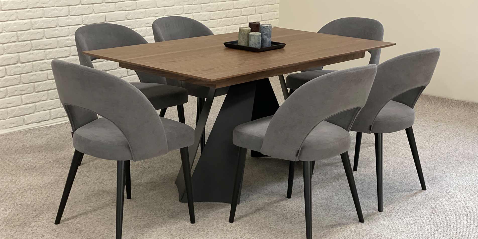 Dining table Cassini with walnut MDF table top and black metal legs with grey chairs