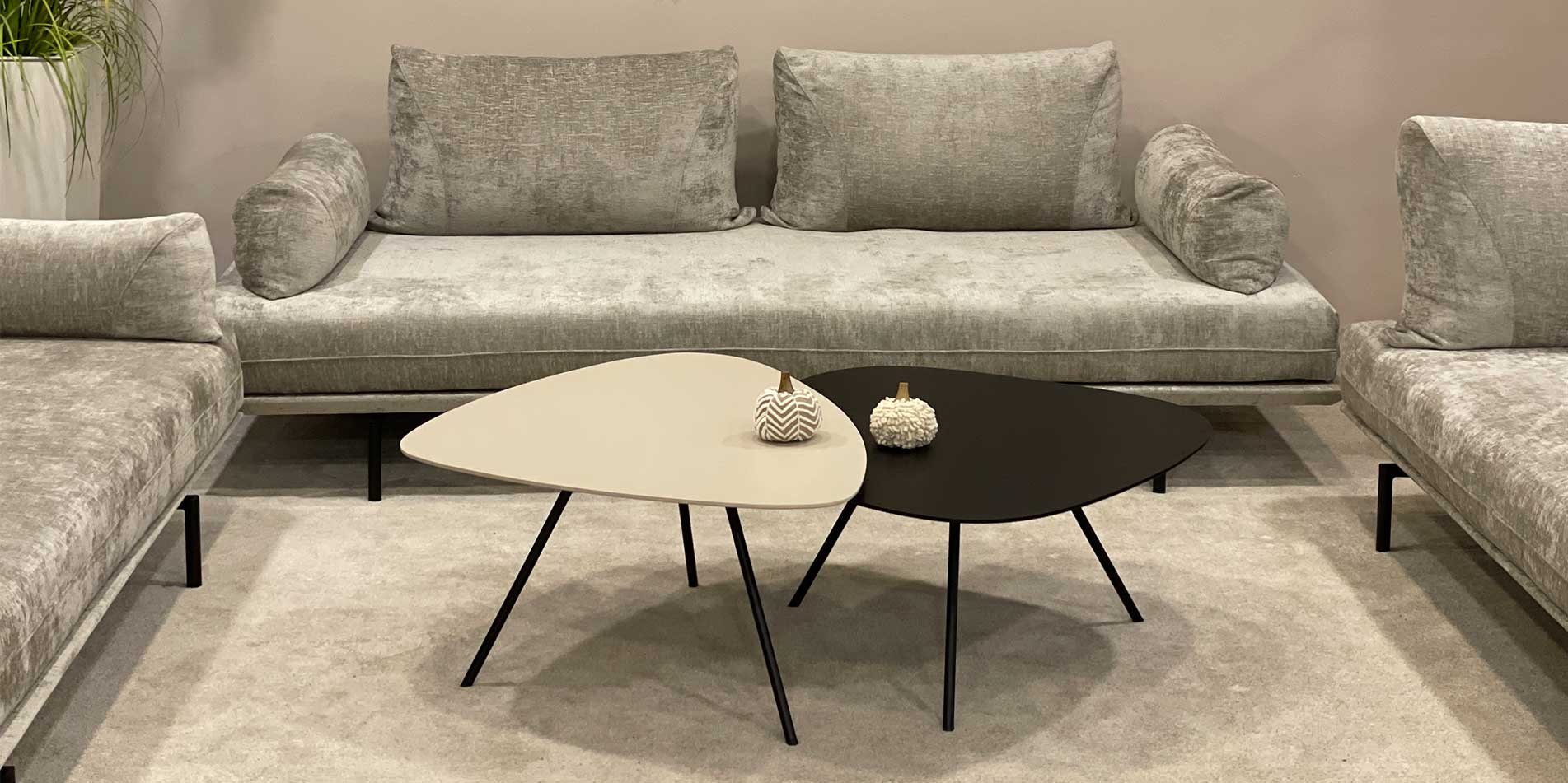 Two coffee tables in different highs and materials