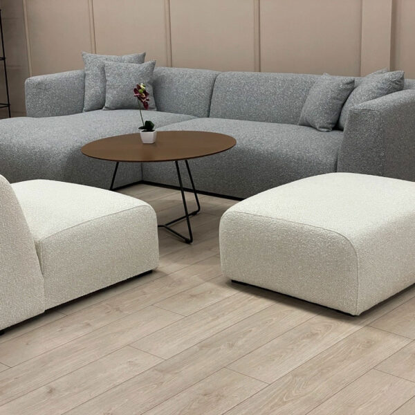 Табуретка во бел мебел штоф во комбинација со сива аголна гарнитура