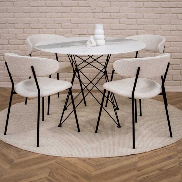 Кружна маса со димензија Ф110 cm со плотна Ламинам си црни метални ногарки со столици во светло бел штоф.