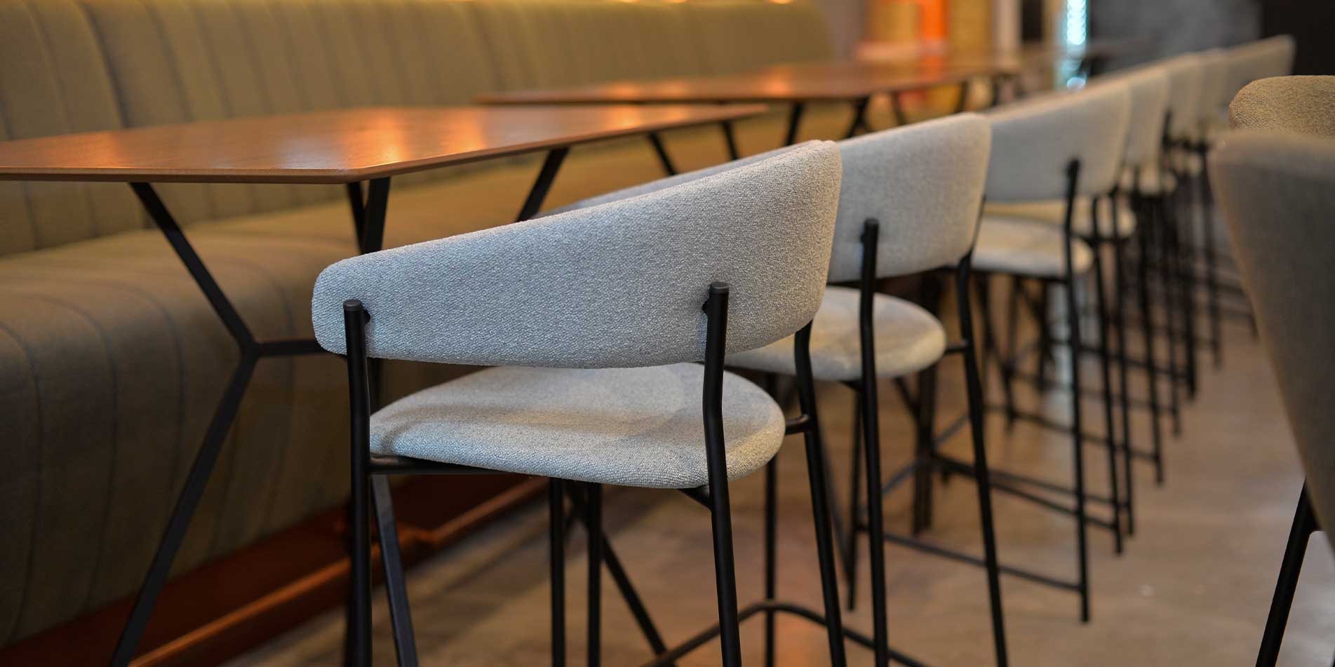 Bar chair Amelie in mint upholstery in lounge bar, combinate with wood walnut.