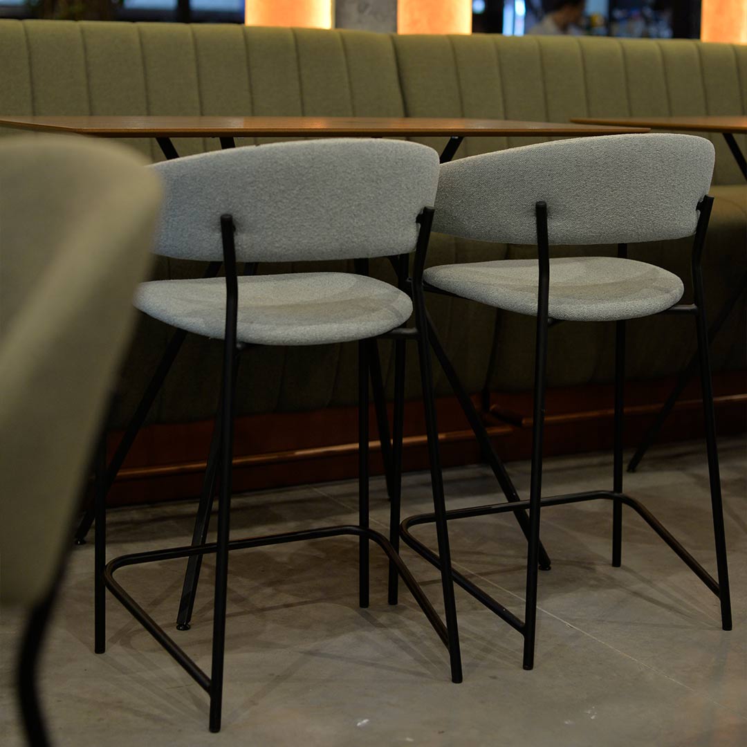 Bar chair Amelie in mint upholstery in lounge bar, combinate with wood walnut.