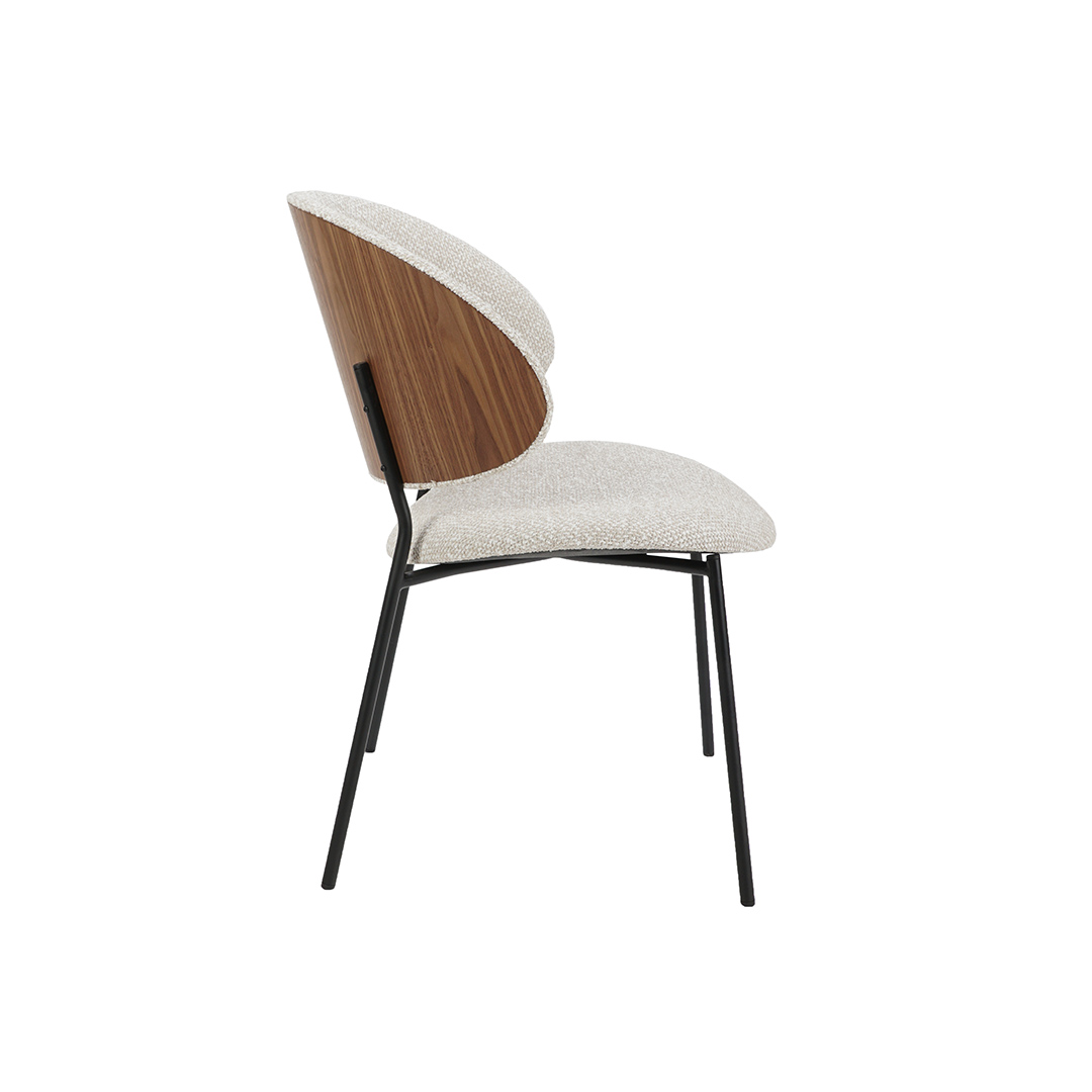 Dining chair with walnut veneer back and beige upholstery.