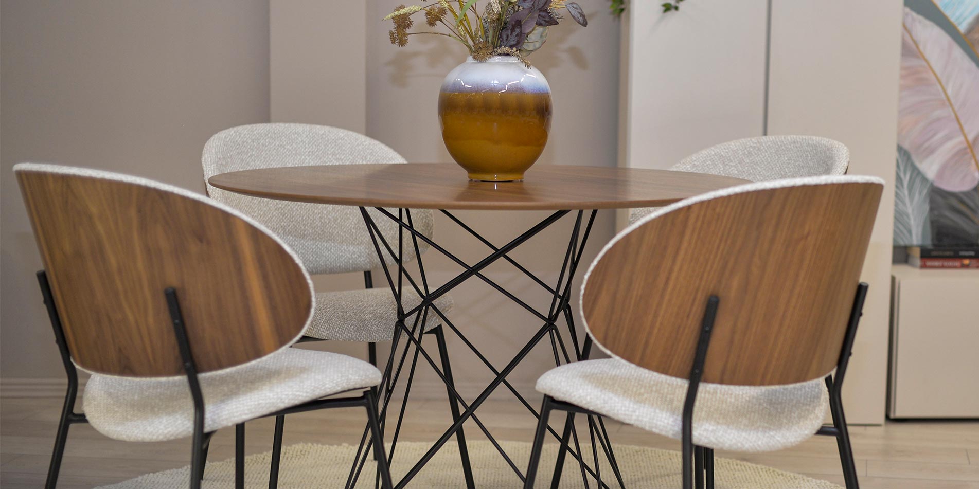 Round dining table with chairs with walnut veneer