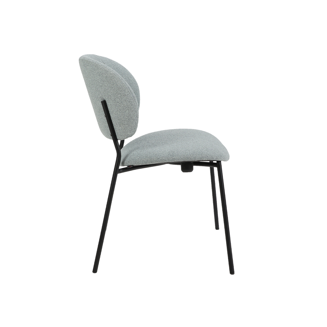 STACKABLE chair with metal legs for conference hall.