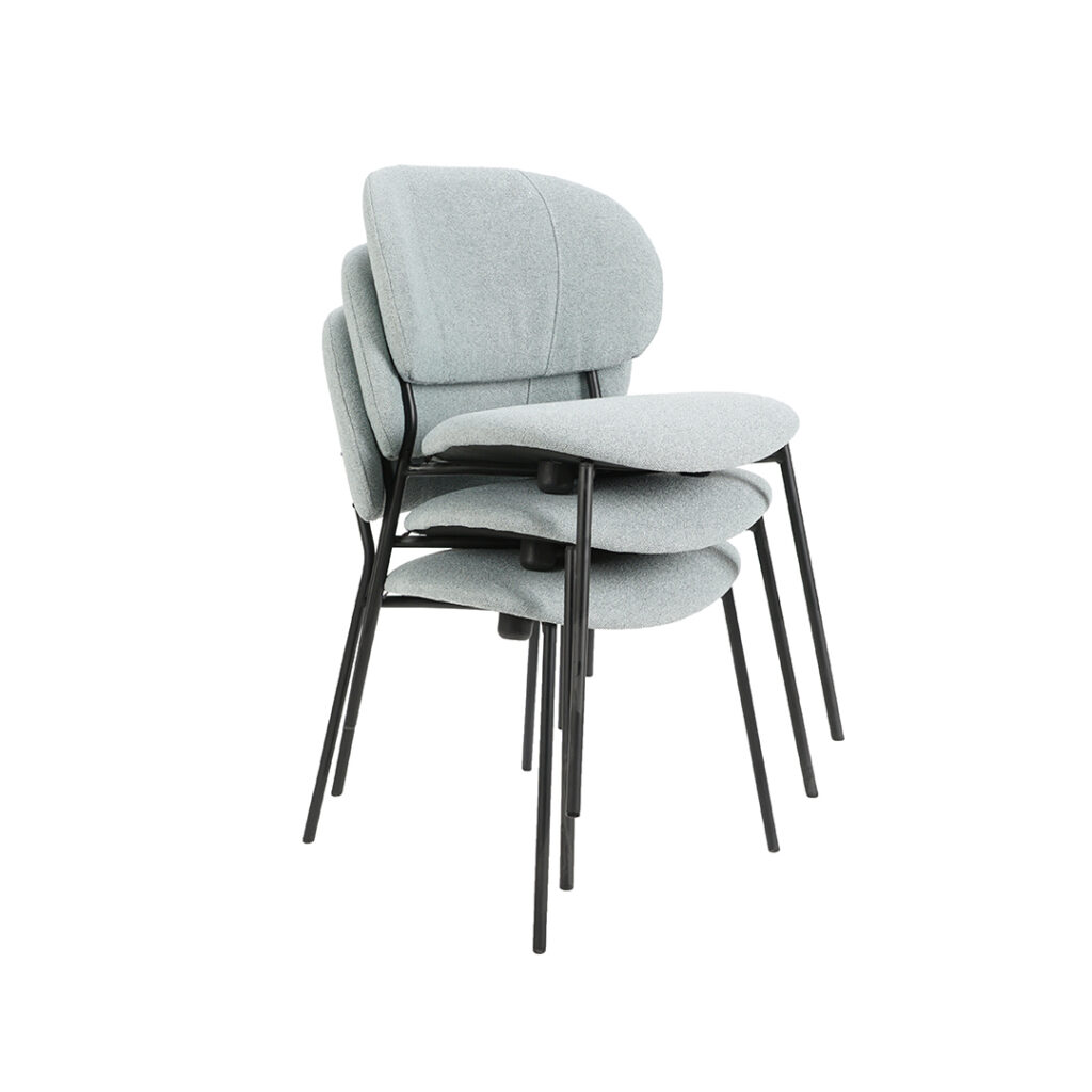 STACKABLE chair with metal legs for conference hall.