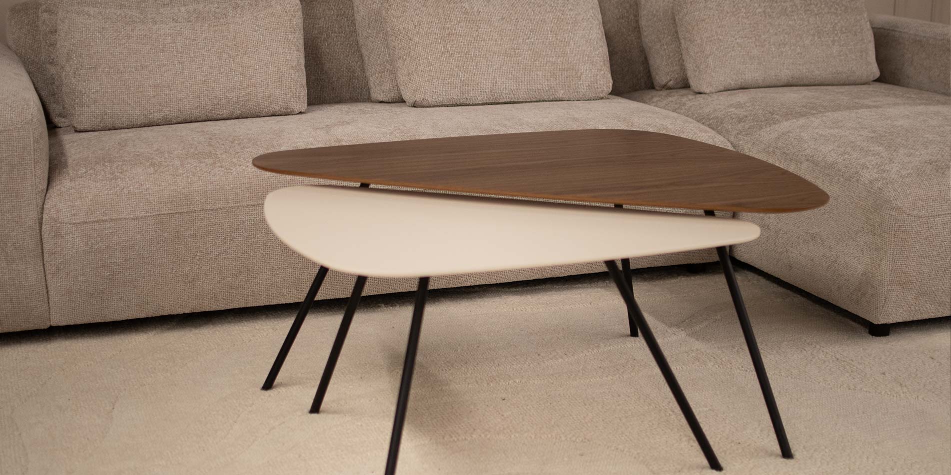 Coffee table with three angle form, in combination of walnut and beige MDF.