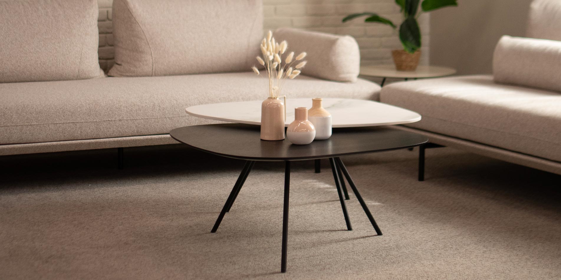 Coffee tables with different form and top, one from oak other from ceramic.