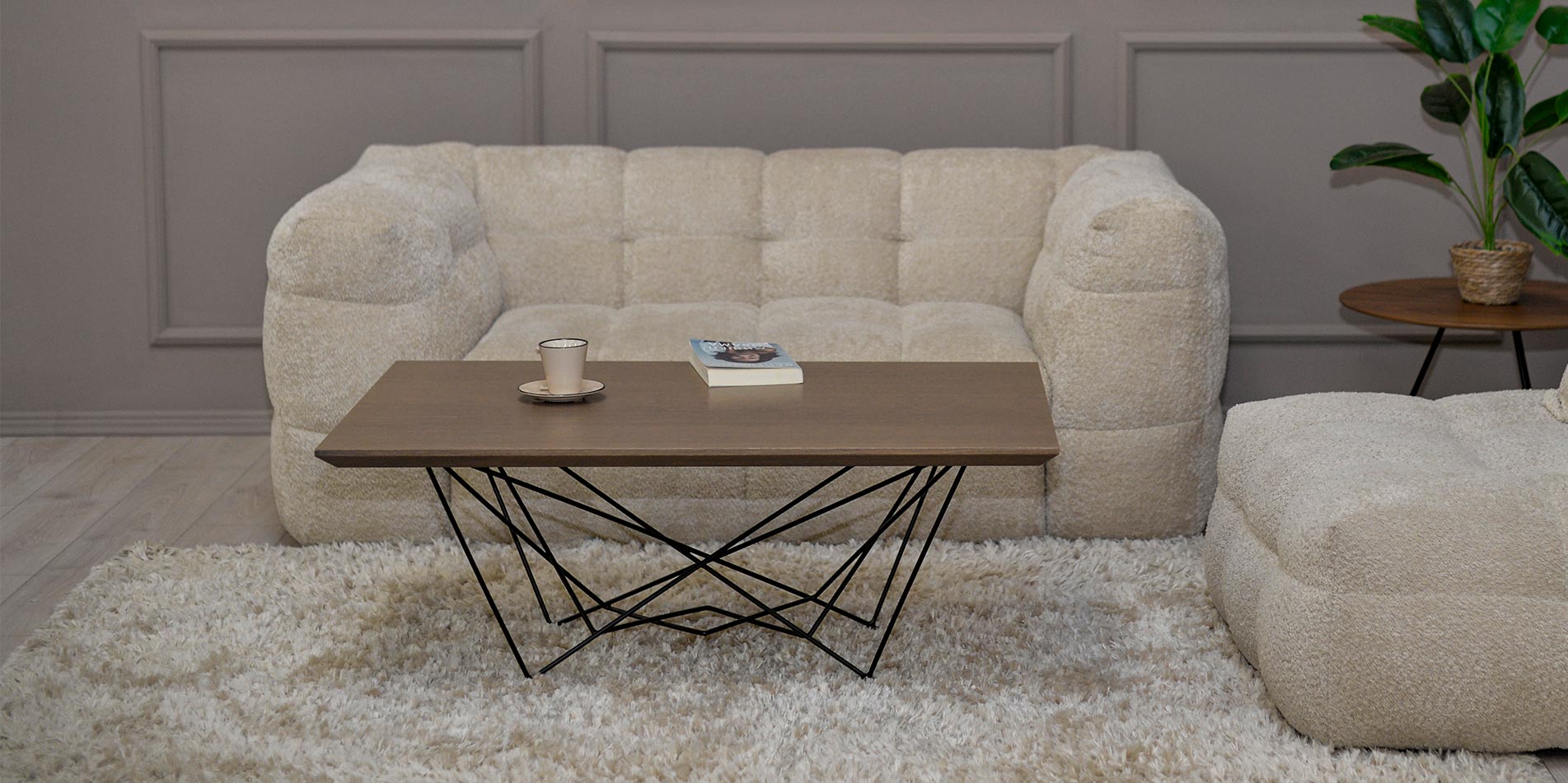 Coffee table with oak table top and metal legs.