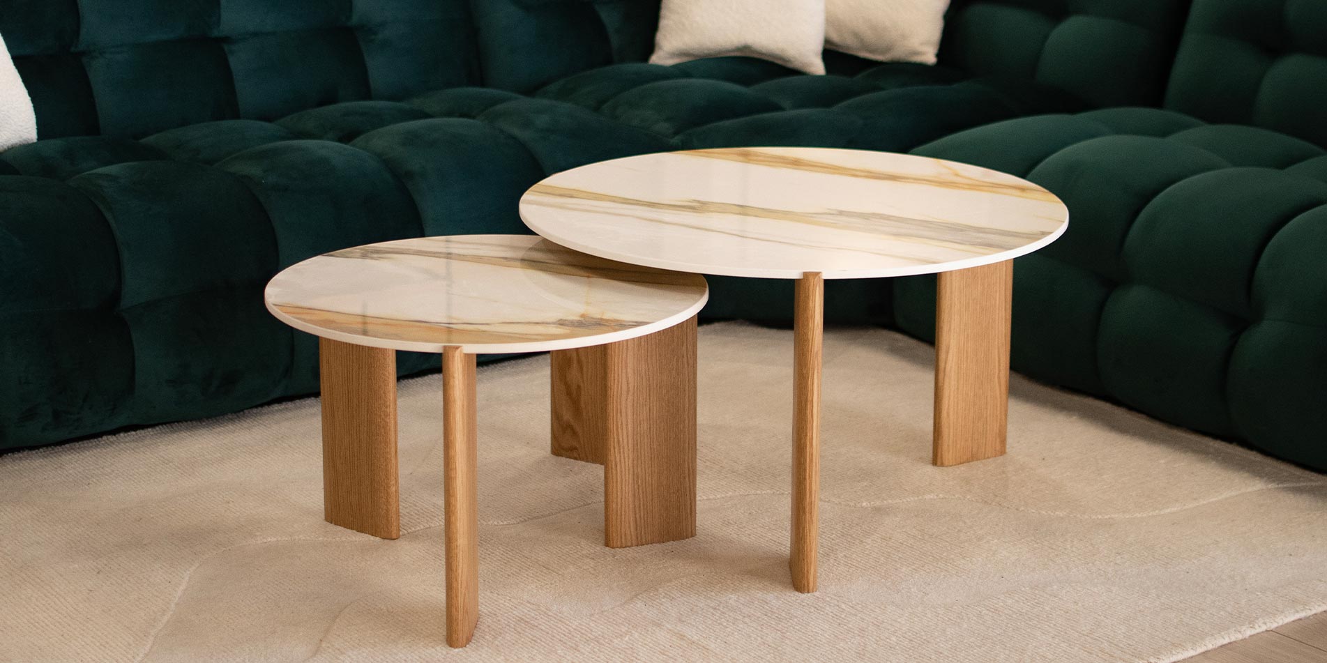 Coffee tables Torio with natural oak legs and a silky-smooth Laminam top.