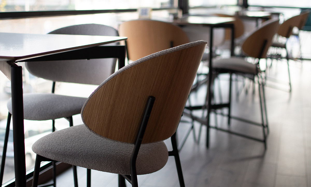 Bar chairs with oak venner on back in coffee bar in Kumanovo.