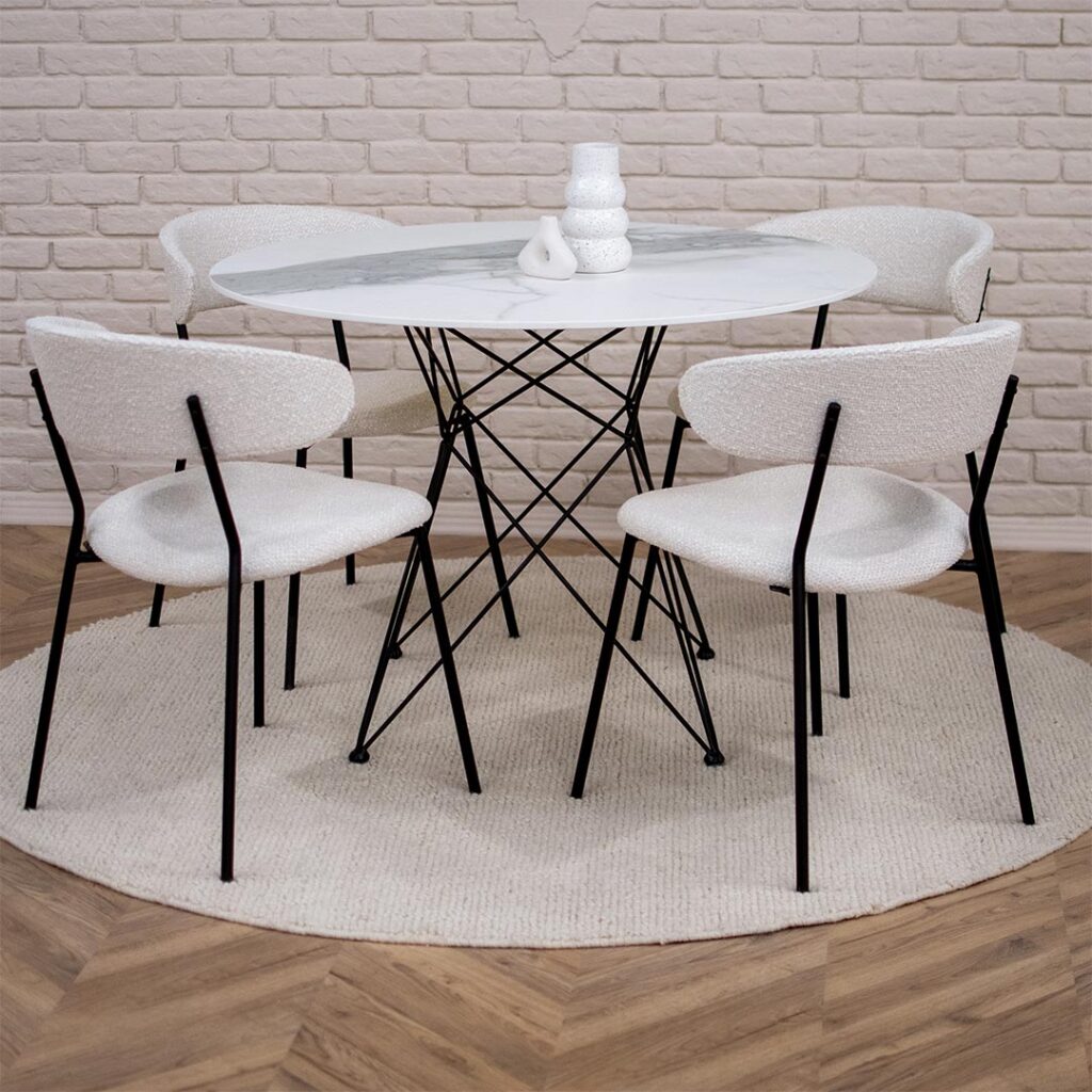 Трпезариски сет со мала кружна маса со керамичка плотна со метални ногарки и 4 столици во бел мебел штоф.