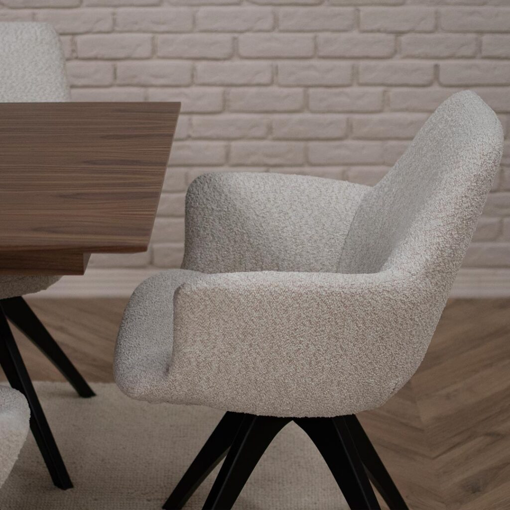 трпезариска столица со раконаслон во крем букле со црни дрвени ногарки на трпезариска маса со плотна орев.