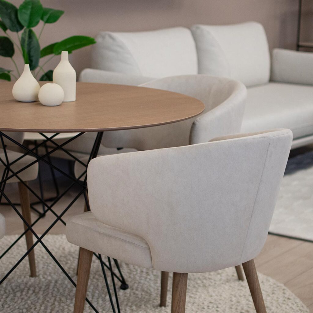 Трпезариски сет со мала крузна маса цо плотна даб и црн метал, со 4 удобни столици со раконаслон во крем велевт.