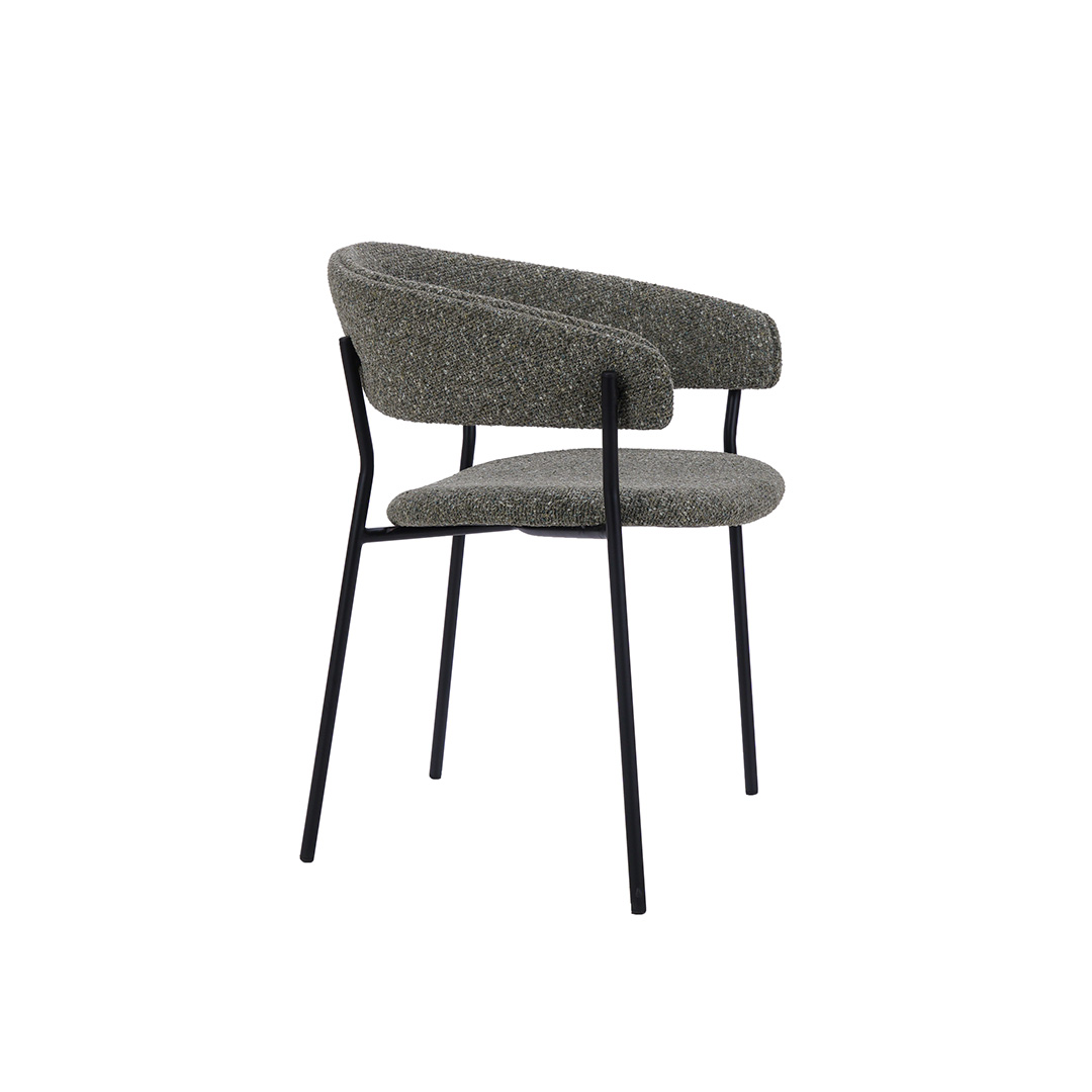 Dining chair in green upholstery and black metal legs.