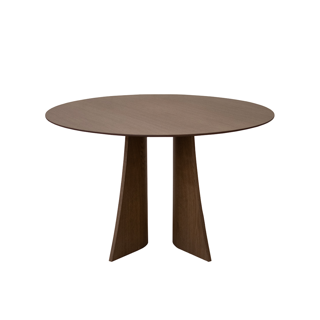Round Astra dining table in oak with sculptural central base, modern wooden dining table isolated on white background